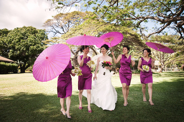 group portrait - bride with bridesmaids in purple dresses and purple parasols - photo by Hawaii based wedding photographer Derek Wong